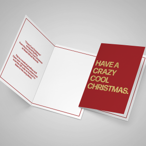 A mockup displaying what the inside and front of the Have A Crazy Cool Christmas greeting card looks like